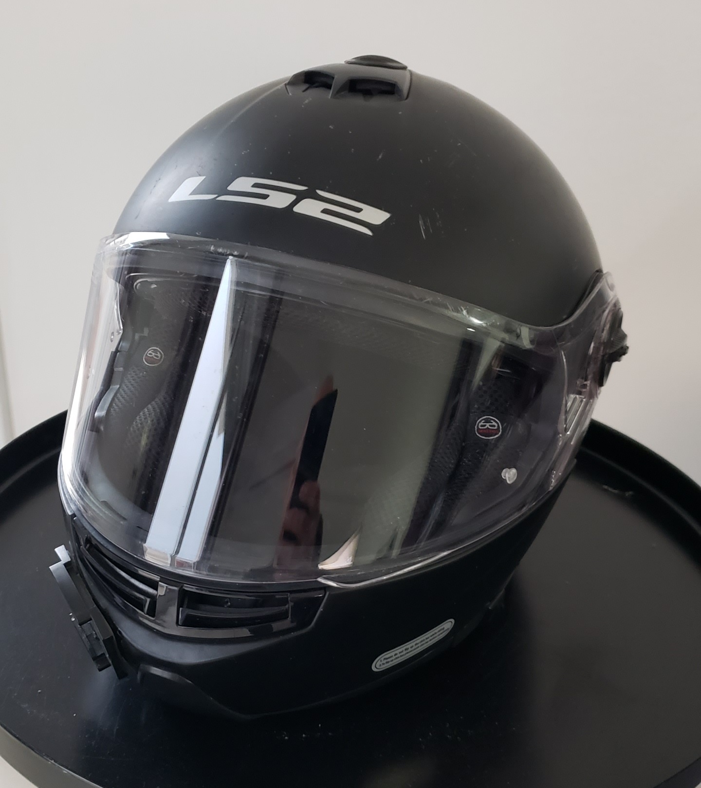 Black motorcycle LS2 helmet
